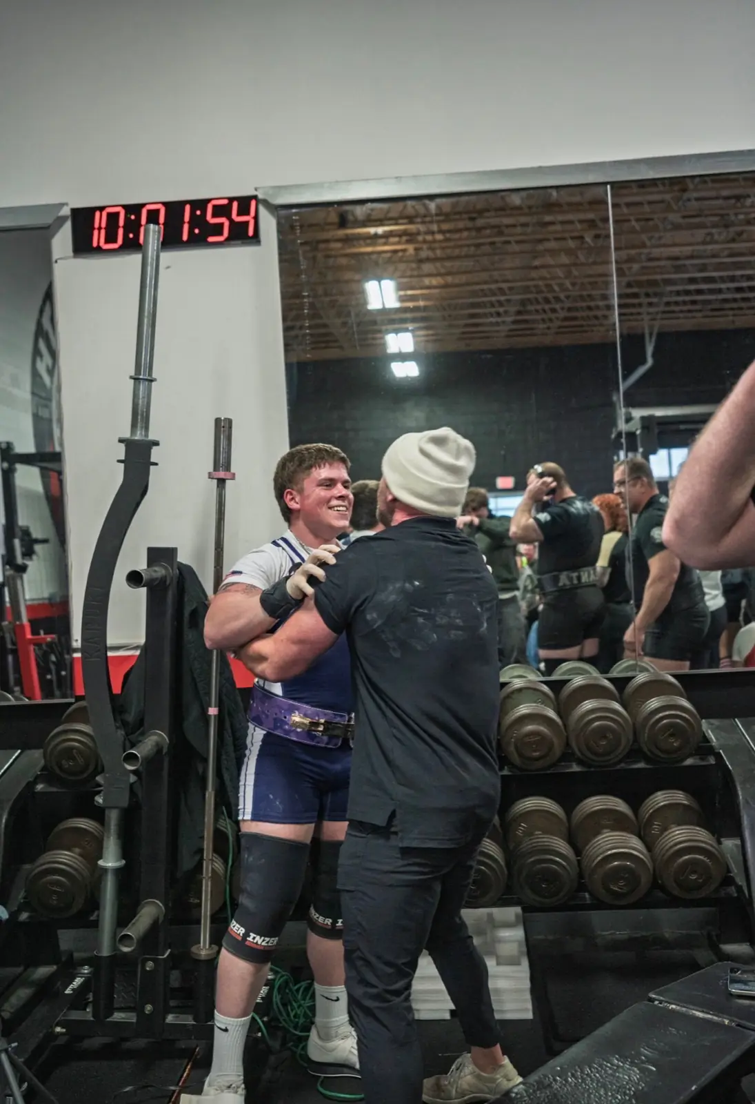 GorillaDiesel coach celebrating with an athlete after a meet